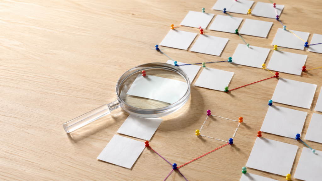 Abstract website search data and user intent map with cards, connectors, and a magnifying glass